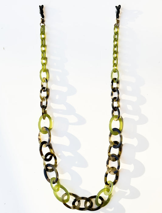 Glasses chain Necklace with green and black chain on a white background