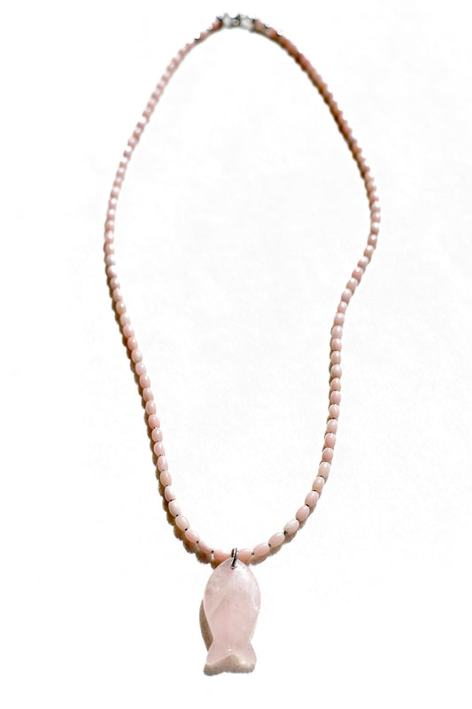 Necklace with pink beads and a fish-shaped pendant on a white background