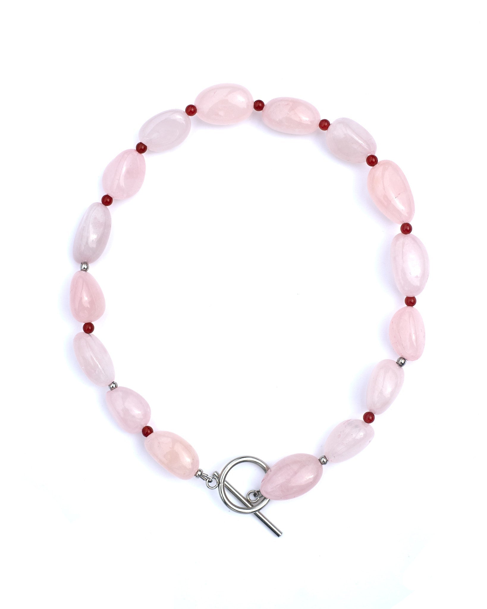 Pink beaded necklace choker with a silver clasp on a white background

